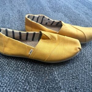 TOMS Kids Yellow Slip-On Shoes